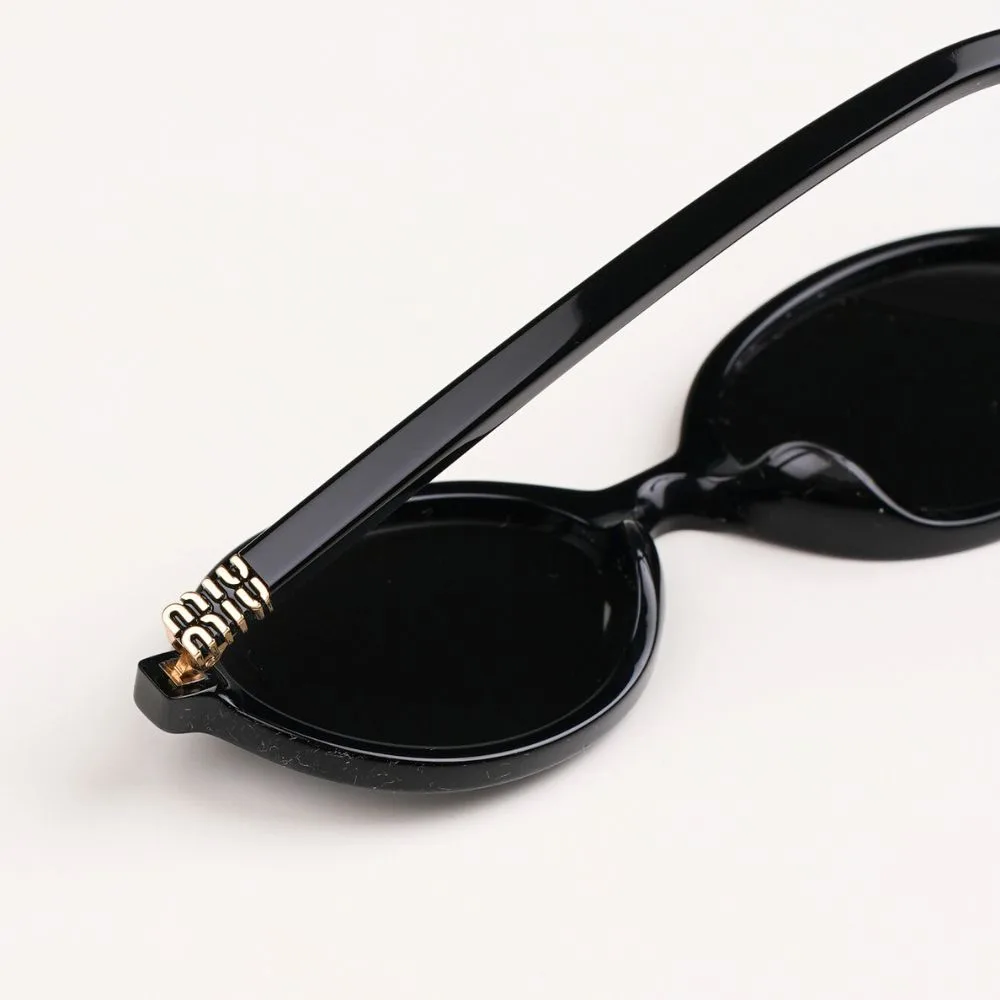 Miu Miu MU 04ZSF 1AB5S0 โลโก้