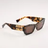 แว่น Miu Miu 09WS VAU06B