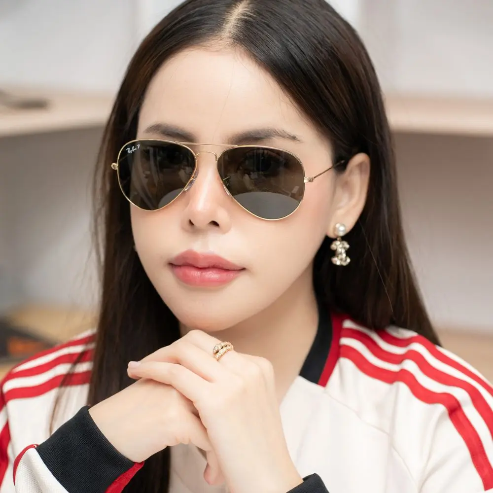 แว่น Ray-Ban RB3025 001/58 คนใส่