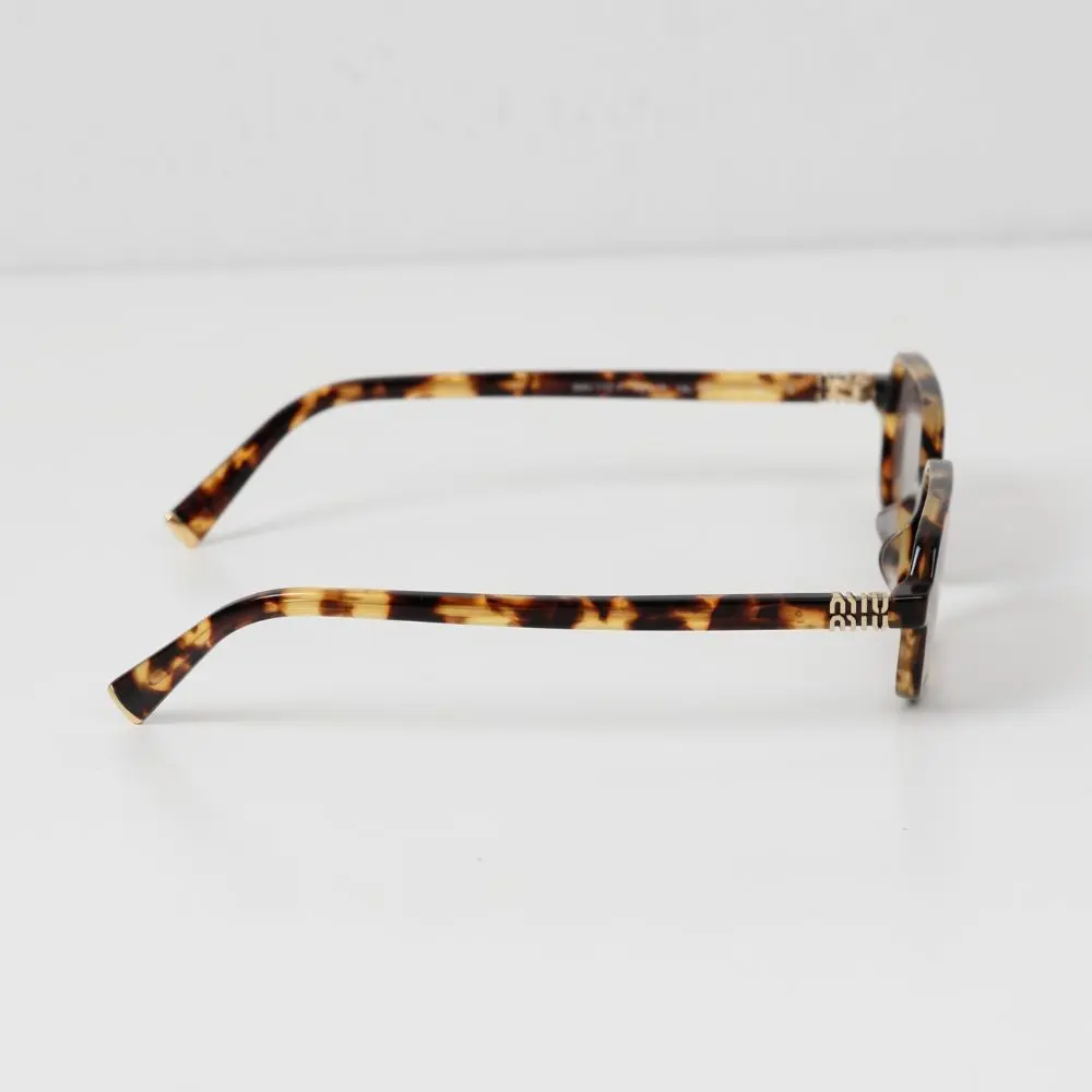 แว่น Miu Miu 11ZSF 14L20I ขา