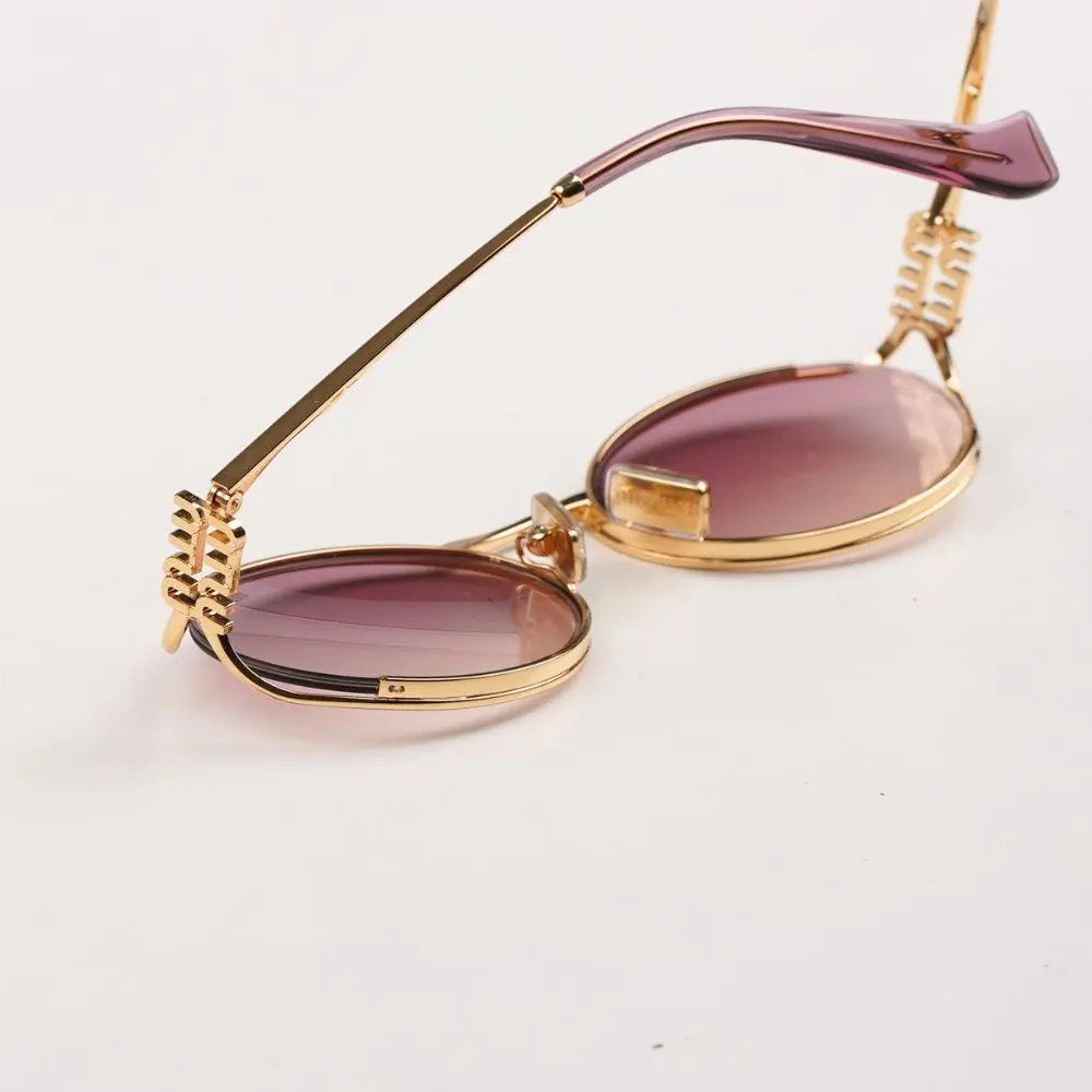 แว่น Miu Miu 52YS 5AK06S โลโก้